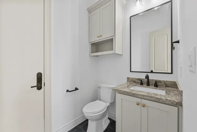Mediterranean Custom Home — Powder room
