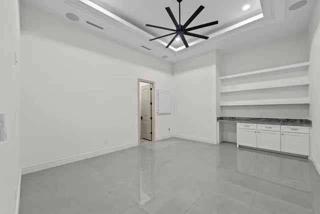 Mediterranean Custom Home — Bedroom with tray ceiling