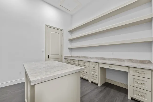 Mediterranean Custom Home — Study with built-in desk