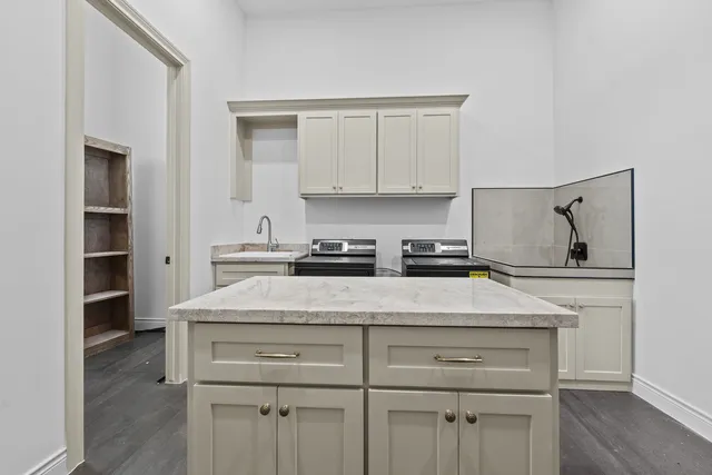 Mediterranean Custom Home — Kitchen island and range