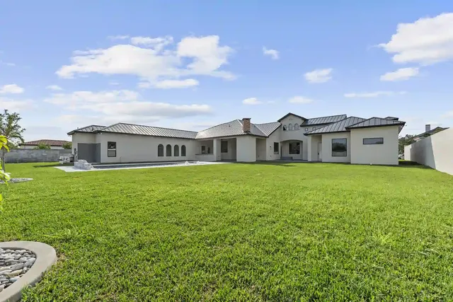 Mediterranean Custom Home — Rear elevation