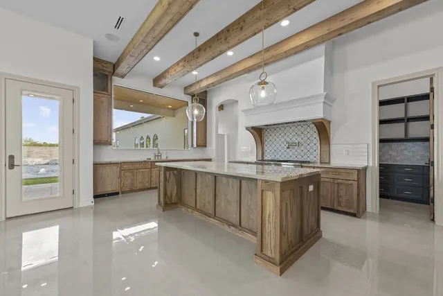 Mediterranean Custom Home — Kitchen with beamed ceiling