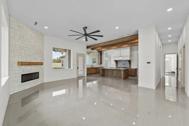 Mediterranean Custom Home — Living room fireplace