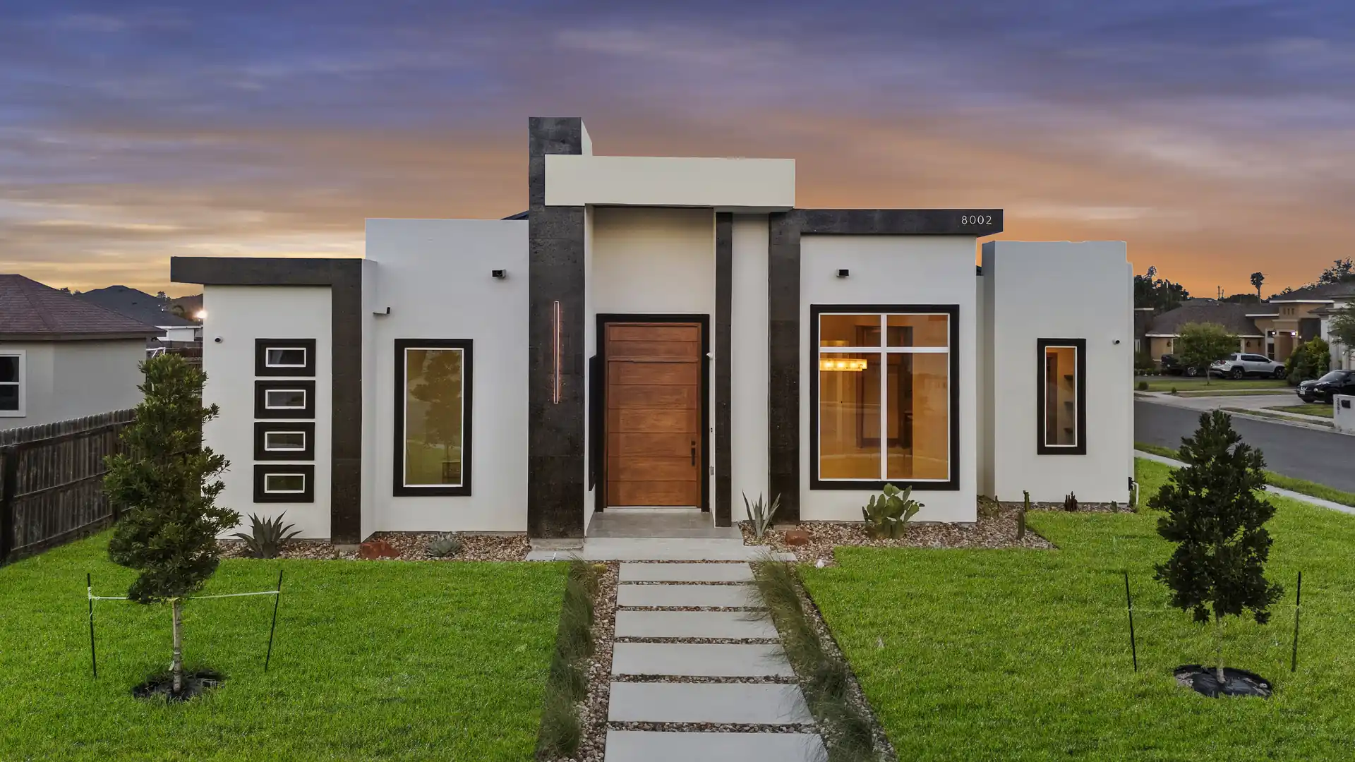 Modern Contemporary Home — Front elevation at dusk