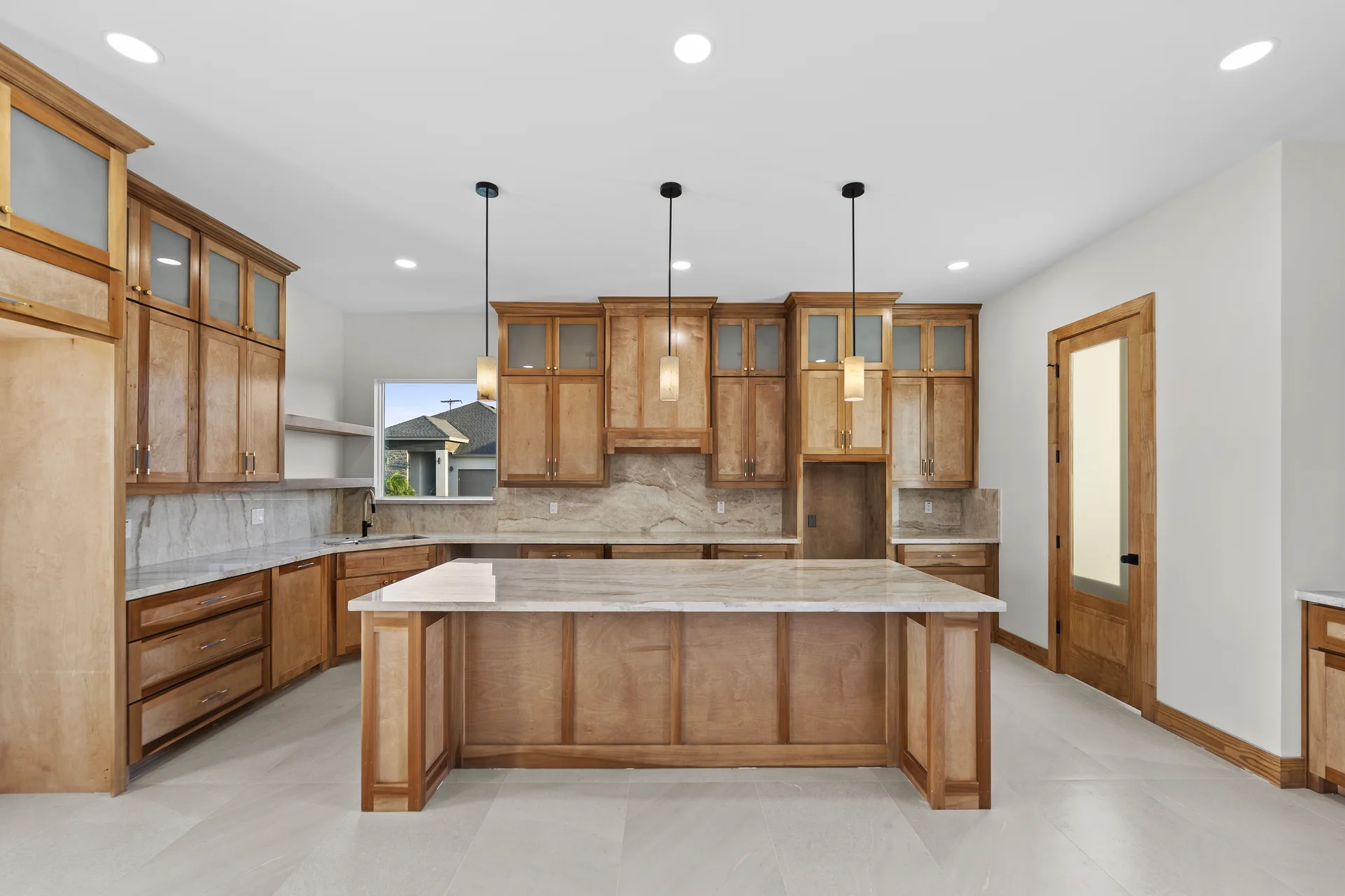 Modern Contemporary Home — Kitchen with pendant lighting